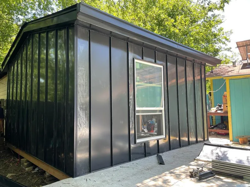 Black standing seam metal wall panels for Roof Inspection in Dumont