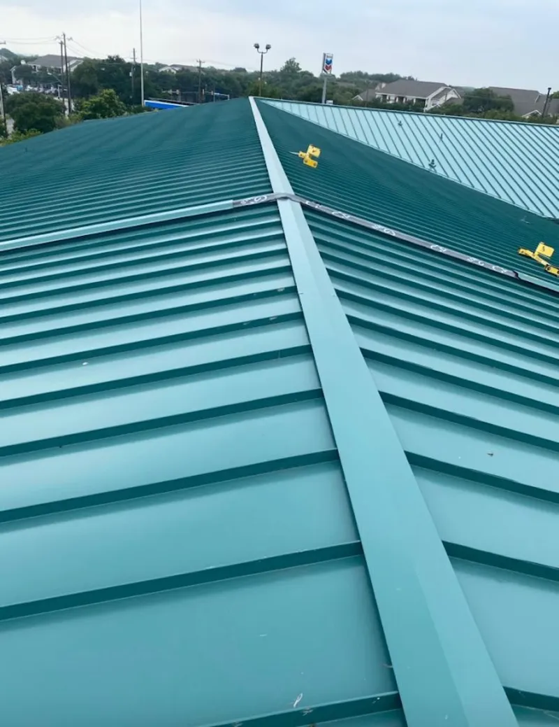 Green commercial metal roof ridge and valley for Metal Roof Repair in Dumont