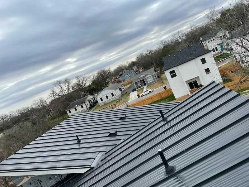 Standing seam metal roof panels with vents for Skylight Repair in Dumont